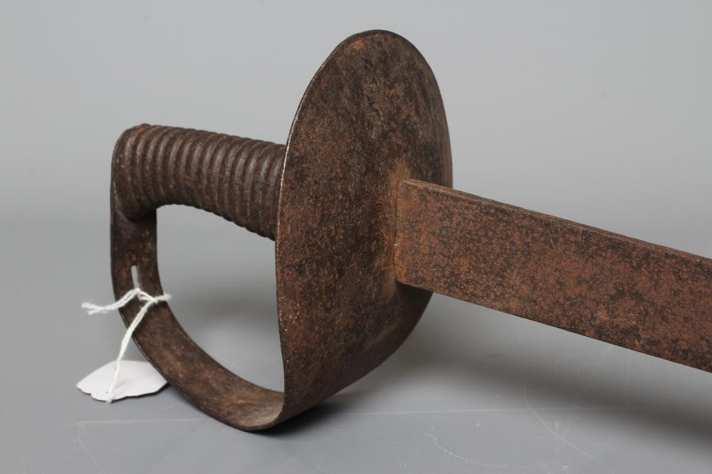 A BRITISH NAVAL CUTLASS with 29" blade, typical hilt and metal ribbed grip, 33 3/4" long (Est. plus Image