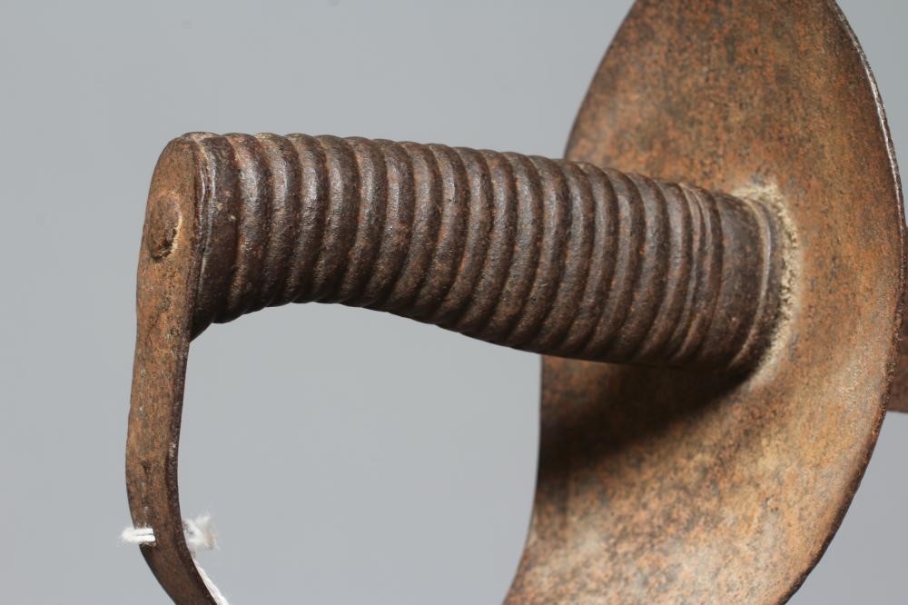 A BRITISH NAVAL CUTLASS with 29" blade, typical hilt and metal ribbed grip, 33 3/4" long (Est. plus Image