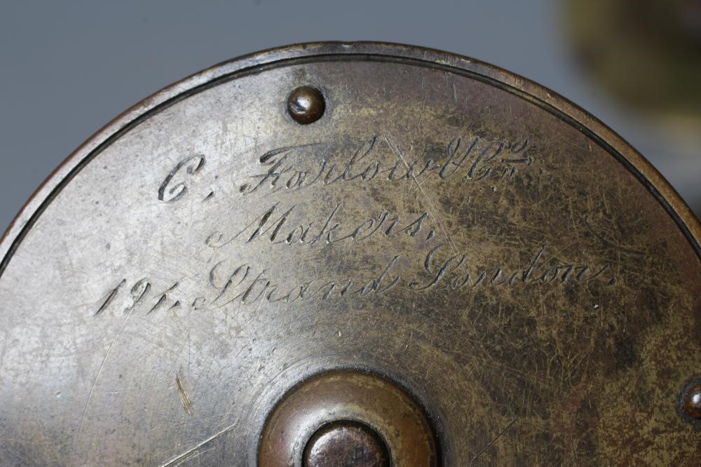 TWELVE ANTIQUE BRASS FISHING REELS, the majority with bone and horn handles, largest 3" diameter Image