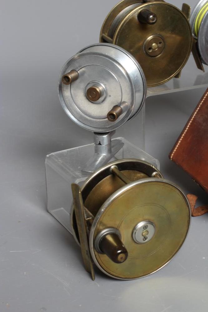 NINE FISHING REELS Image