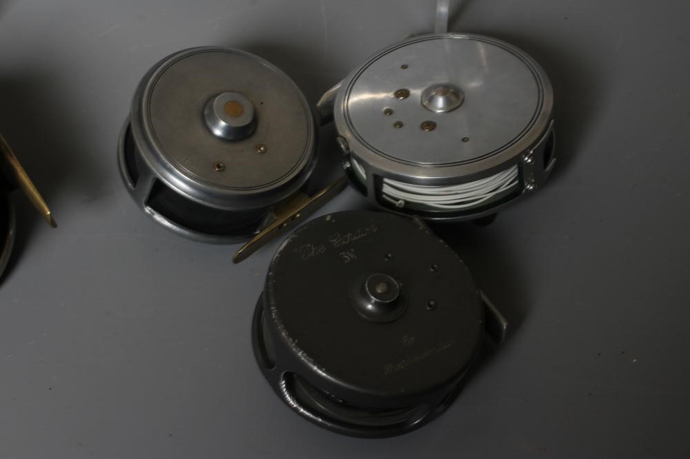 NINE FISHING REELS Image