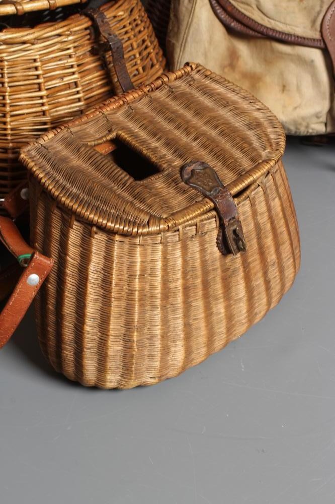 FOUR FISHING CREELS, including three wicker examples, one with canvas pouch and lid, and a small Image