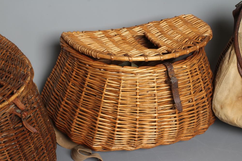 FOUR FISHING CREELS, including three wicker examples, one with canvas pouch and lid, and a small Image