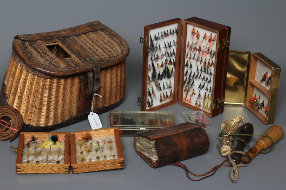 AN ANTIQUE FISHING CREEL AND CONTENTS Image