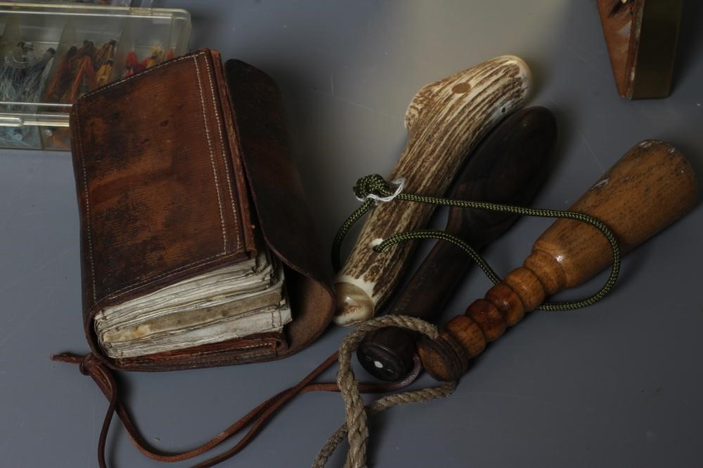 AN ANTIQUE FISHING CREEL AND CONTENTS Image