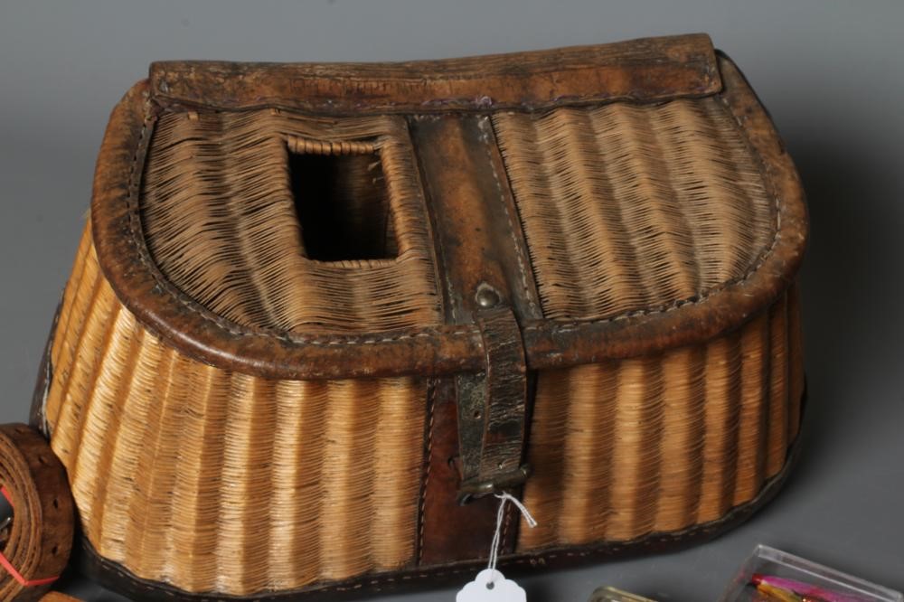 AN ANTIQUE FISHING CREEL AND CONTENTS Image