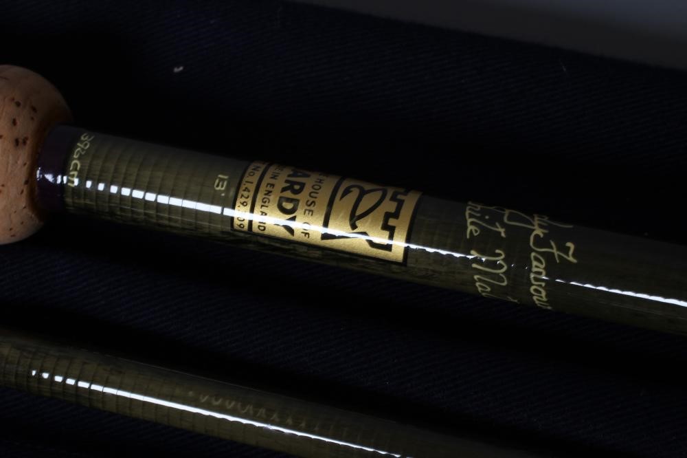 TWO HARDY GRAPHITE FISHING RODS, comprising a three piece 12' #6/7 trout rod and a "Favourite Image