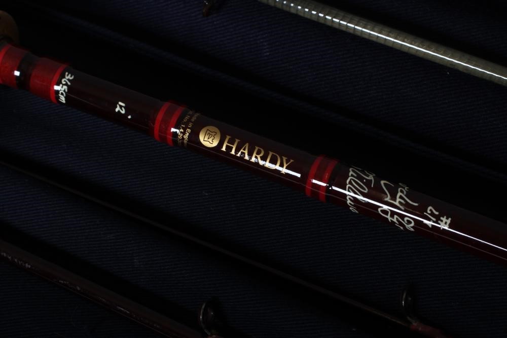 TWO HARDY GRAPHITE FISHING RODS, comprising a three piece 12' #6/7 trout rod and a "Favourite Image