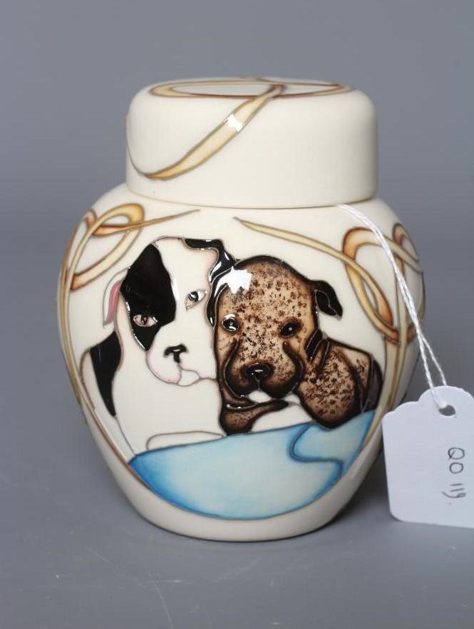 A MOORCROFT POTTERY HAPPY STAFFIES JAR AND COVER, 2019, designed by Vicky Lovatt, impressed and Image