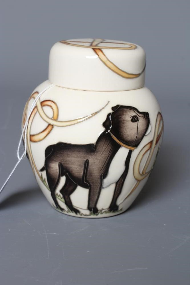 A MOORCROFT POTTERY HAPPY STAFFIES JAR AND COVER, 2019, designed by Vicky Lovatt, impressed and Image