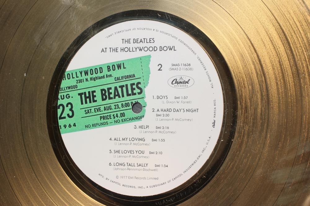 A PRESENTATION "GOLD" SALES AWARD for the Capitol Records album The Beatles At The Hollywood Bowl, Image