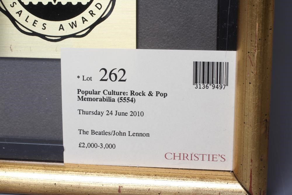 A PRESENTATION "GOLD" SALES AWARD for the Capitol Records album The Beatles At The Hollywood Bowl, Image