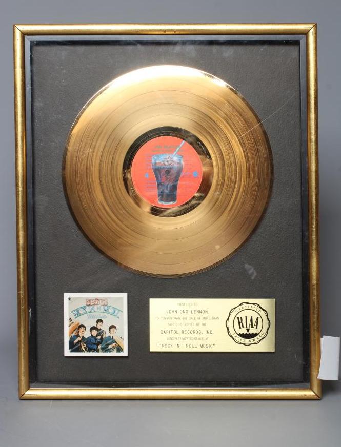 A PRESENTATION "GOLD" SALES AWARD for the Capitol Records album Rock 'N' Roll Music, R.I.A.A. Image