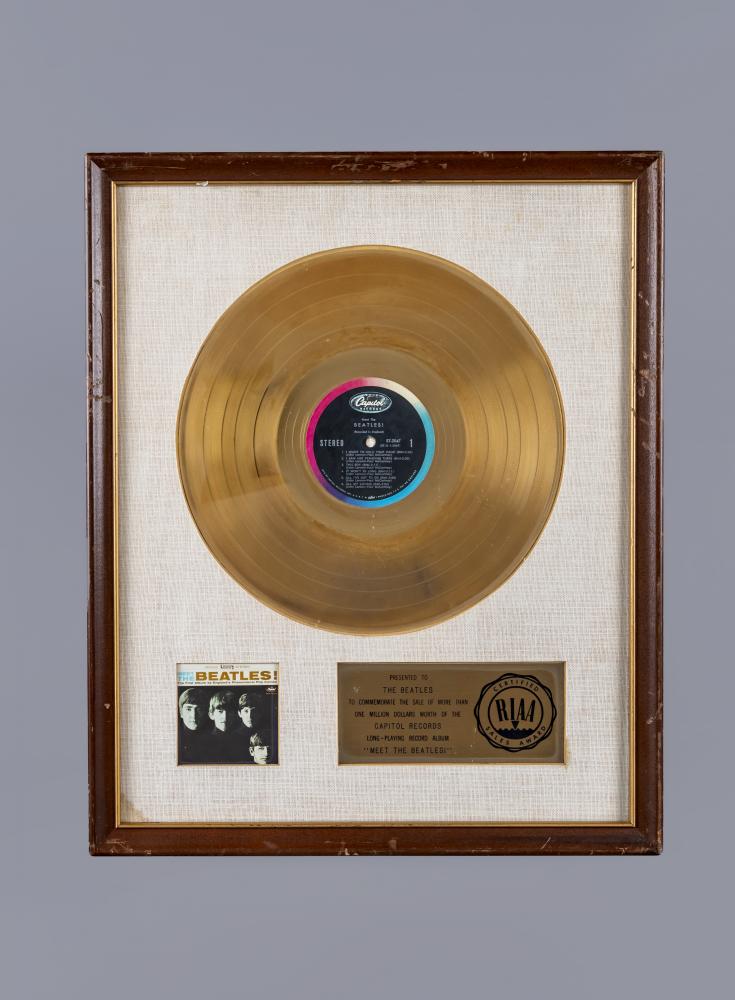 A PRESENTATION "GOLD" SALES AWARD for the Capitol Records album Meet The Beatles R.I.A.A. certified, Image