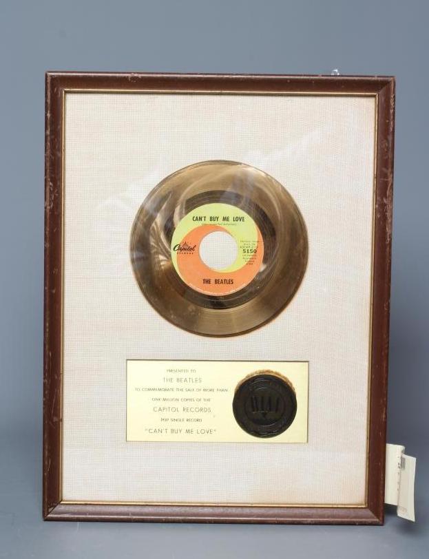 A PRESENTATION "GOLD" SALES AWARD for the single Can't Buy Me Love, R.I.A.A. certified, presented to Image