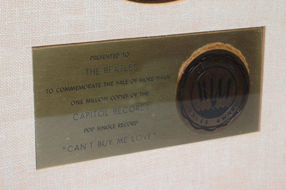 A PRESENTATION "GOLD" SALES AWARD for the single Can't Buy Me Love, R.I.A.A. certified, presented to Image