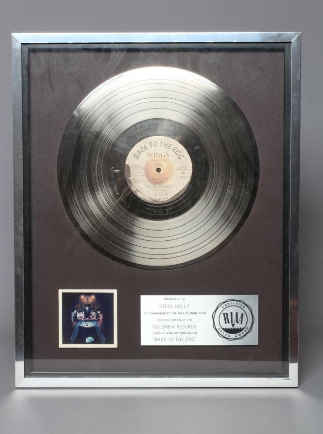 A PRESENTATION "SILVER" SALES AWARD for the album Back to the Egg (sunny side up) Image