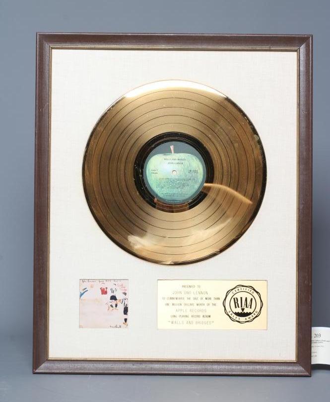 A PRESENTATION "GOLD" SALES AWARD for the Apple Records album Walls and Bridges, R.I.A.A. certified, Image