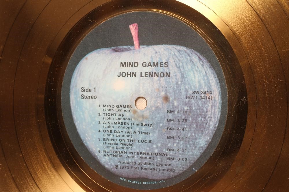 A PRESENTATION "GOLD" SALES AWARD for the Apple Records album Mind Games, R.I.A.A. certified, Image