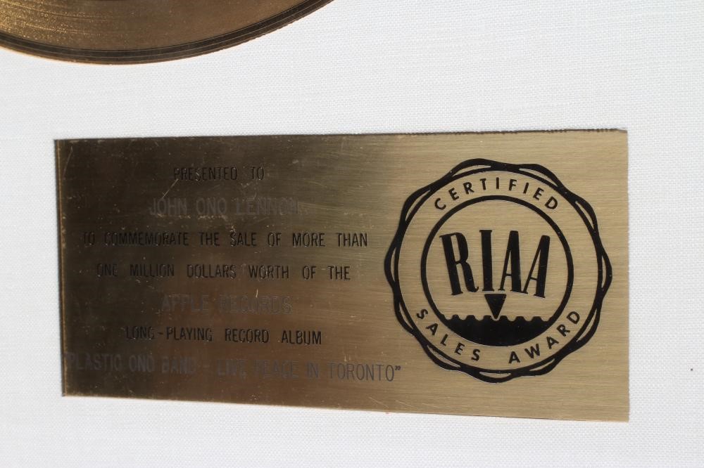 A PRESENTATION "GOLD" SALES AWARD for the album The Plastic Ono Band - Live Peace in Toronto 1969 Image