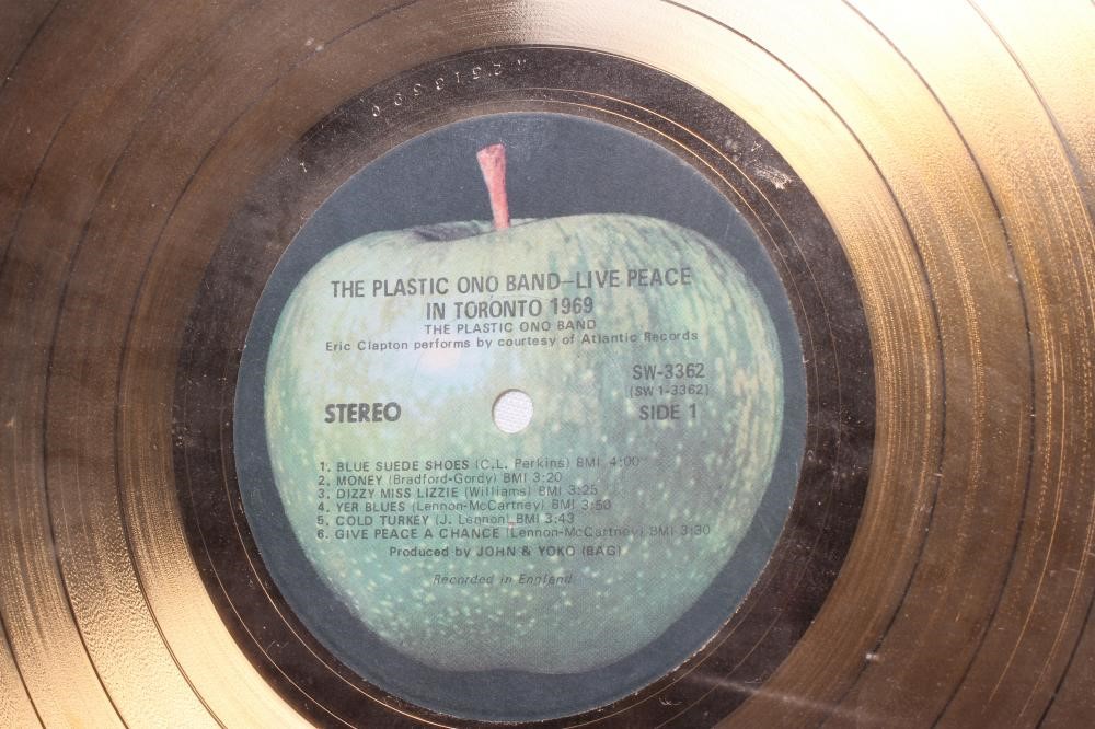 A PRESENTATION "GOLD" SALES AWARD for the album The Plastic Ono Band - Live Peace in Toronto 1969 Image