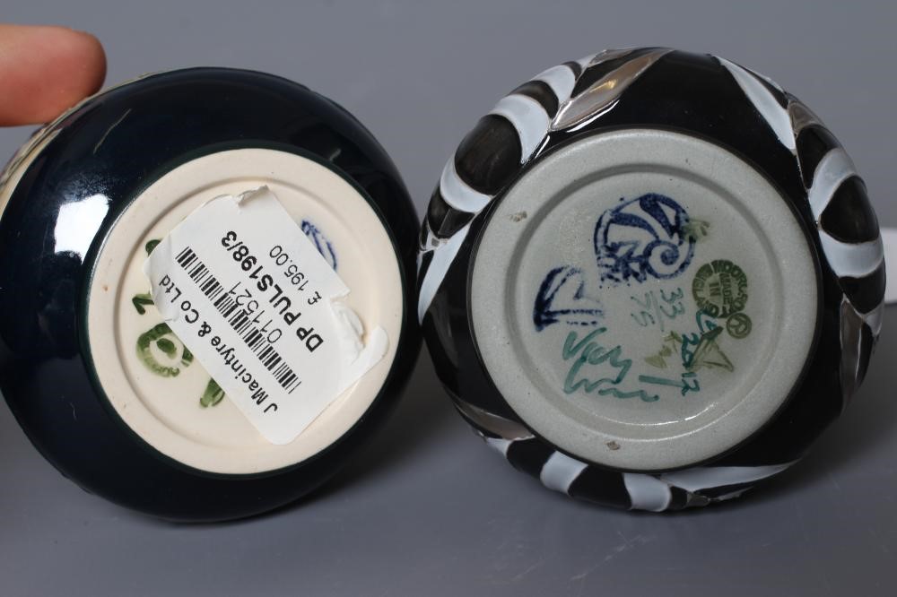 TWO MOORCROFT POTTERY VASES of squat tapering cylindrical form and comprising Shining Fern Image