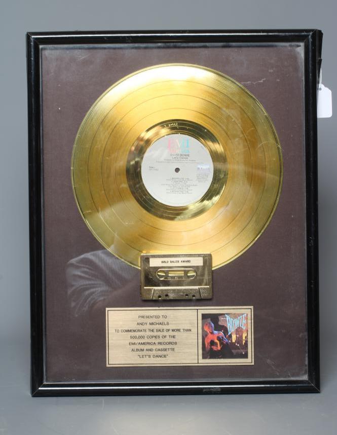 A PRESENTATION "GOLD" SALES AWARD for the album David Bowie Let's Dance, with record and tape Image