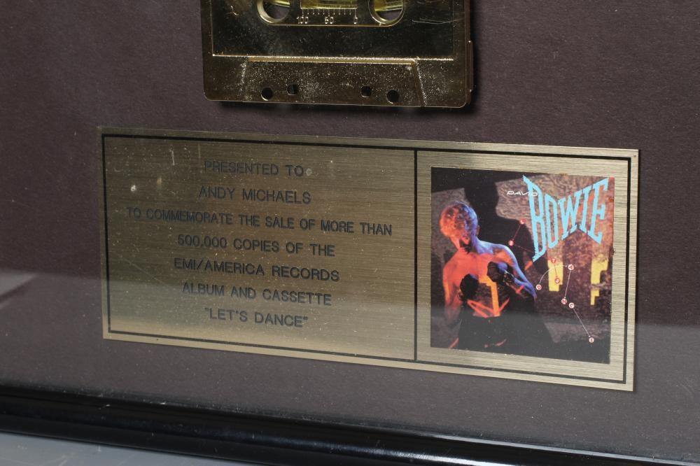 A PRESENTATION "GOLD" SALES AWARD for the album David Bowie Let's Dance, with record and tape Image
