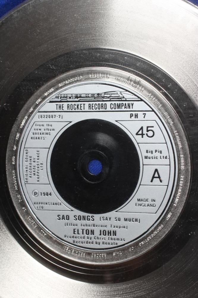 A PRESENTATION "SILVER" SALES AWARD for the Rocket single Sad Songs (Say So Much) by Elton John, Image
