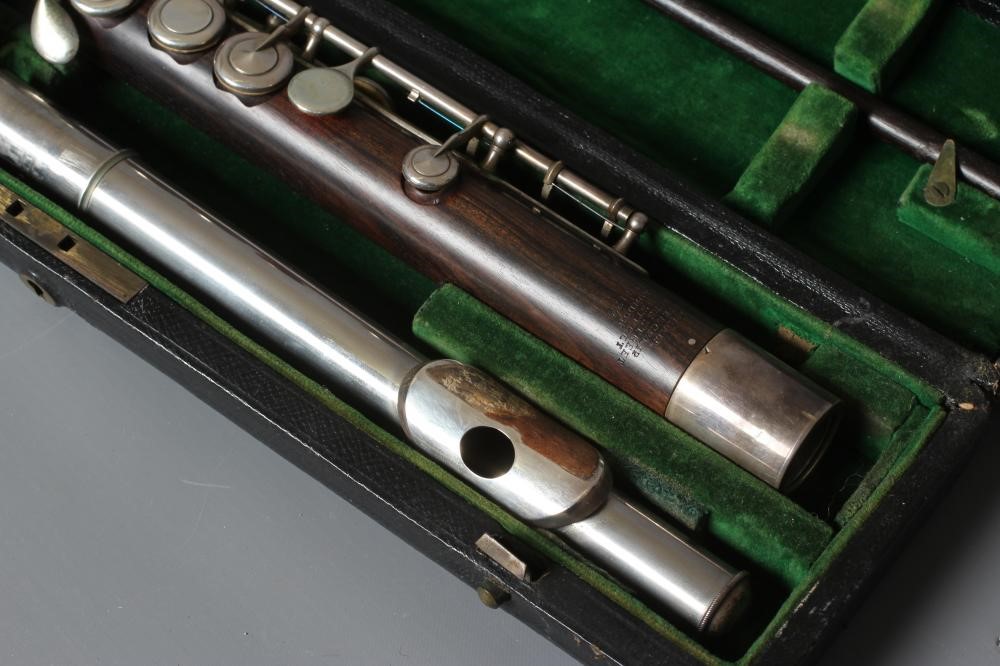A CARTE & CO. LTD. ROSEWOOD FLUTE, early 20th century, stamped 23 Berners St., London, in original Image