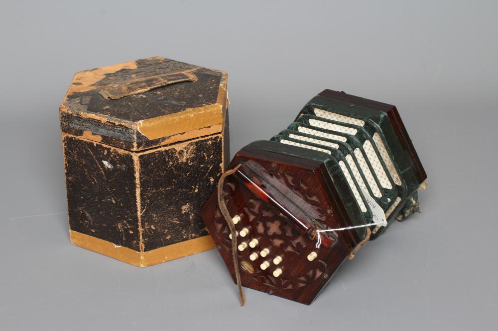 A LACHENAL AND CO. MAHOGANY CONCERTINA, 19th century, of hexagonal form with five fold leather Image