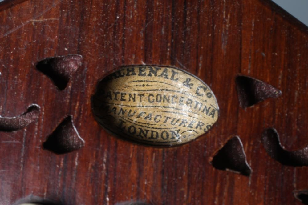 A LACHENAL AND CO. MAHOGANY CONCERTINA, 19th century, of hexagonal form with five fold leather Image