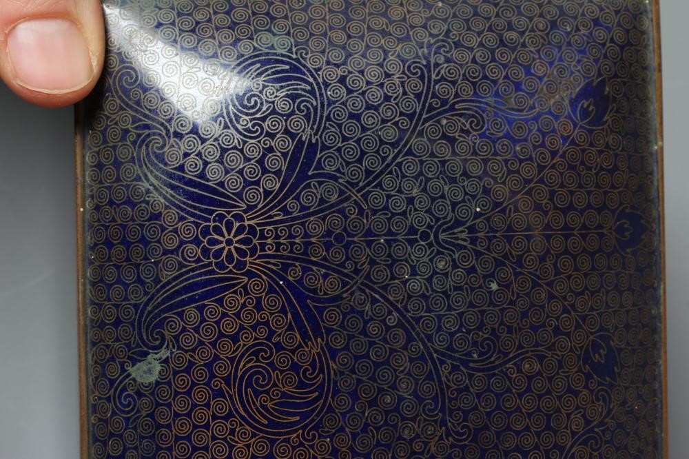 A CHINESE CLOISONNE ENAMEL CIGARETTE BOX of plain oblong form raised upon four ball feet Image