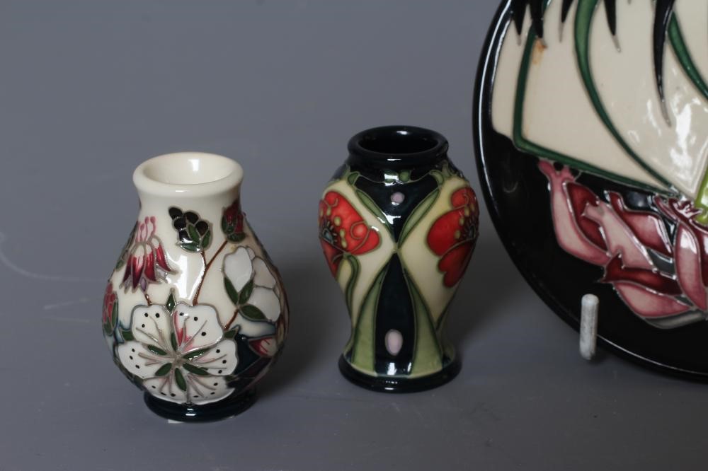 FOUR MOORCROFT POTTERY MINIATURE VASES comprising September Glory Image