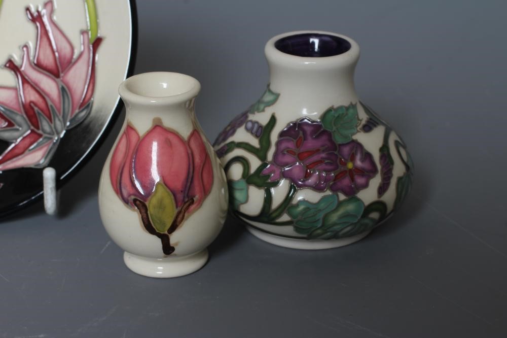 FOUR MOORCROFT POTTERY MINIATURE VASES comprising September Glory Image