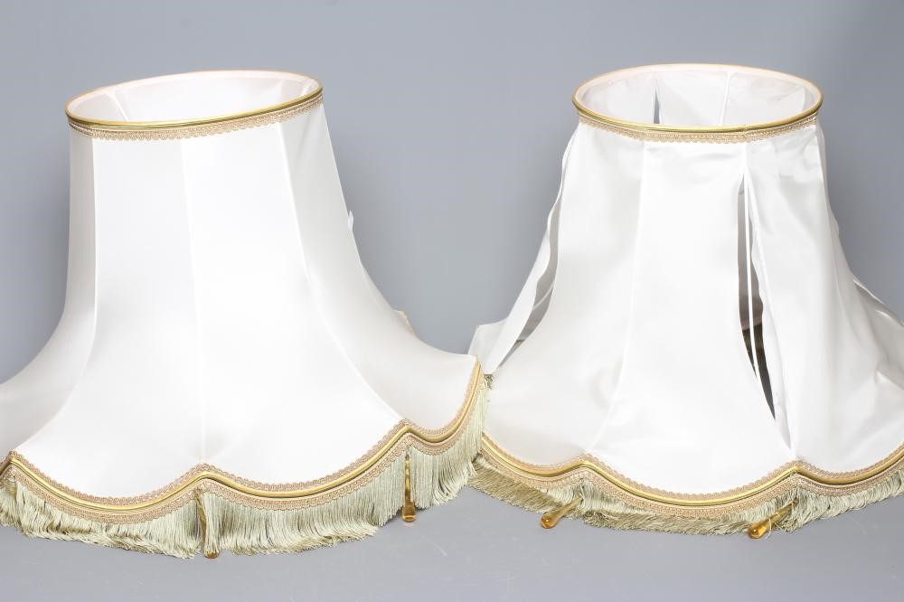 A PAIR OF WHITE OPAQUE OVERLAY CRANBERRY GLASS ELECTRIC TABLE LAMPS Image
