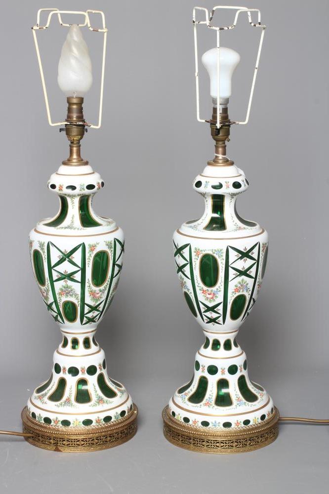 A PAIR OF WHITE OPAQUE OVERLAY GREEN GLASS ELECTRIC TABLE LAMPS Image