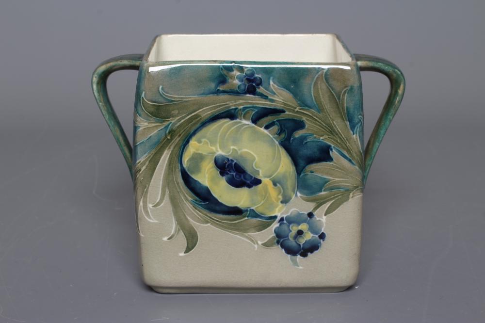 A MOORCROFT POTTERY LATE FLORIAN PATTERN BISCUIT BARREL Image