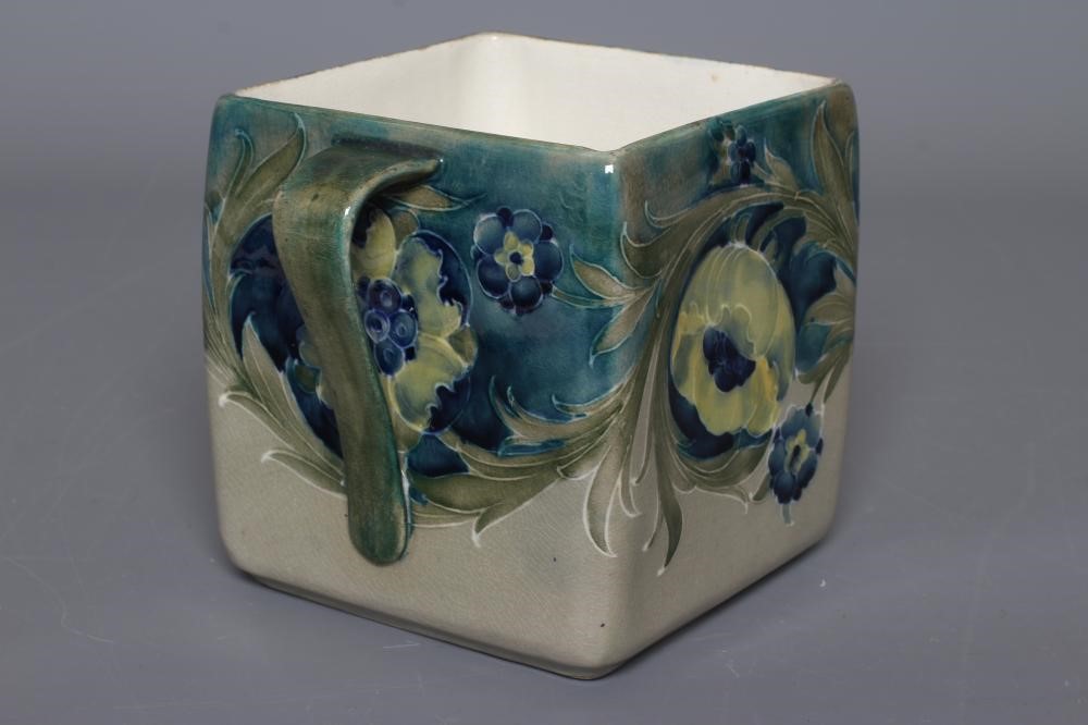 A MOORCROFT POTTERY LATE FLORIAN PATTERN BISCUIT BARREL Image