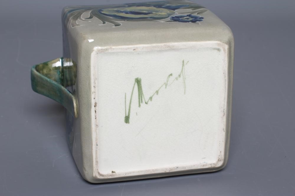 A MOORCROFT POTTERY LATE FLORIAN PATTERN BISCUIT BARREL Image