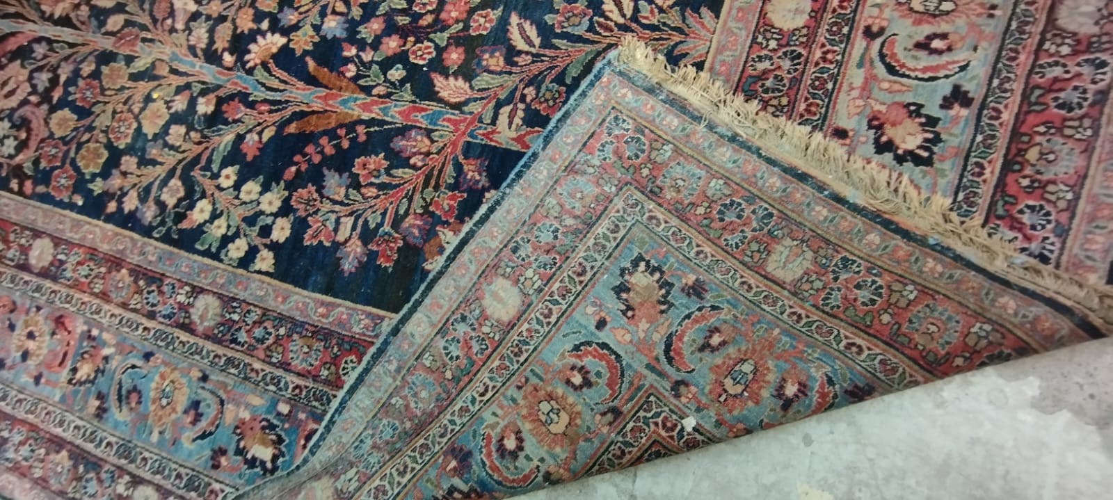 A PERSIAN CARPET, 20th century, the indigo field with Tree of Life style design within pale blue Image