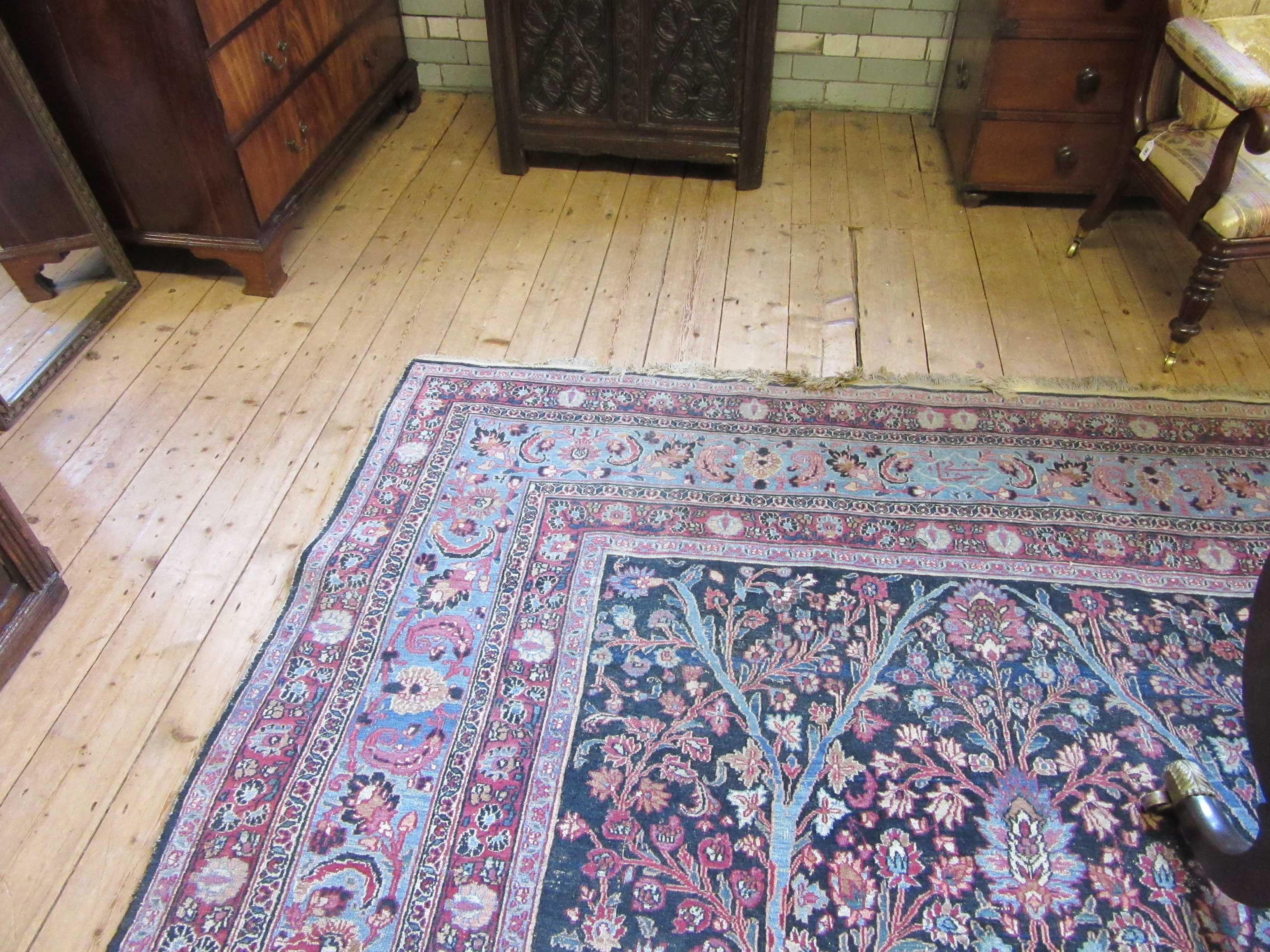 A PERSIAN CARPET, 20th century, the indigo field with Tree of Life style design within pale blue Image