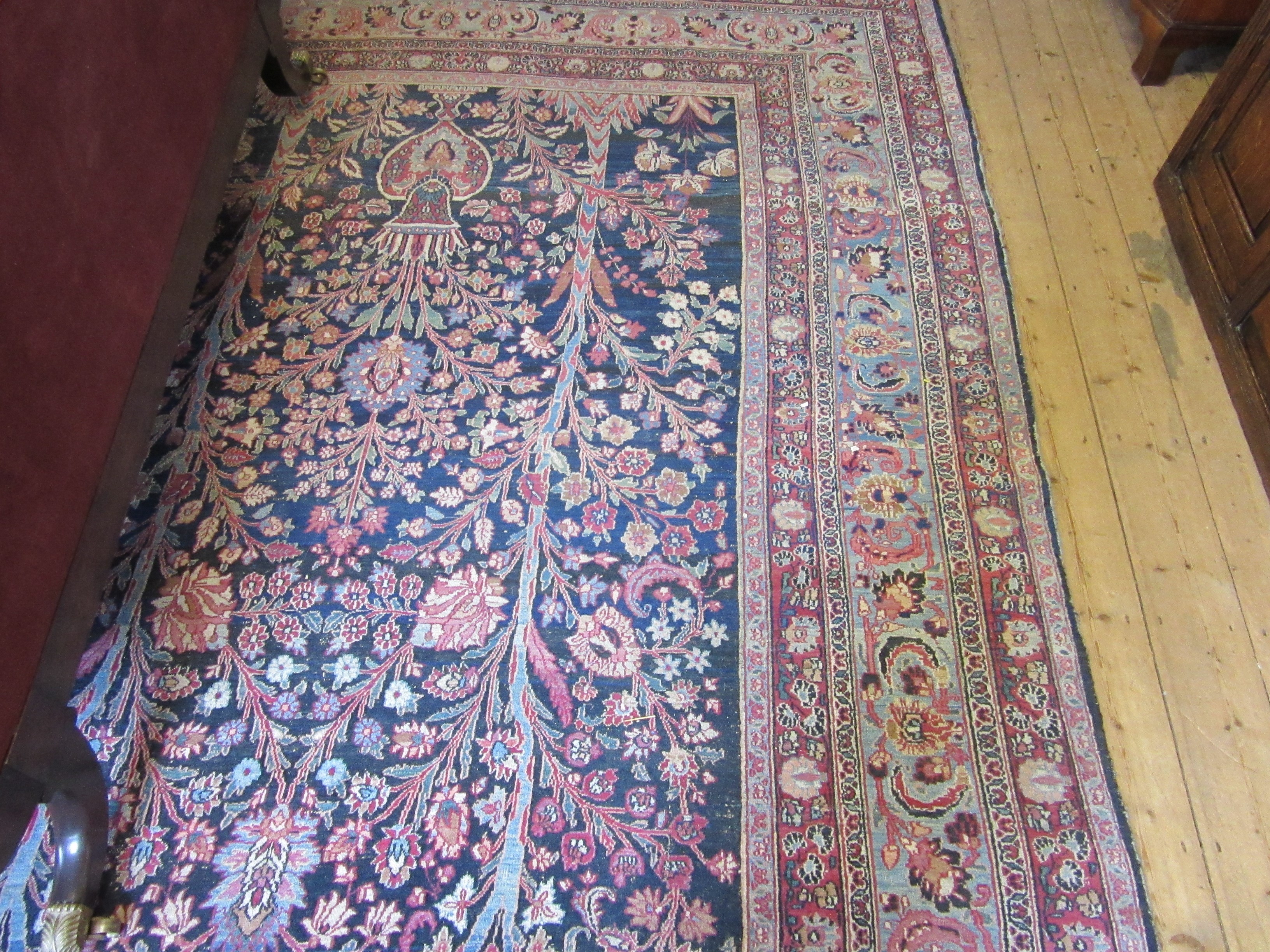 A PERSIAN CARPET, 20th century, the indigo field with Tree of Life style design within pale blue Image