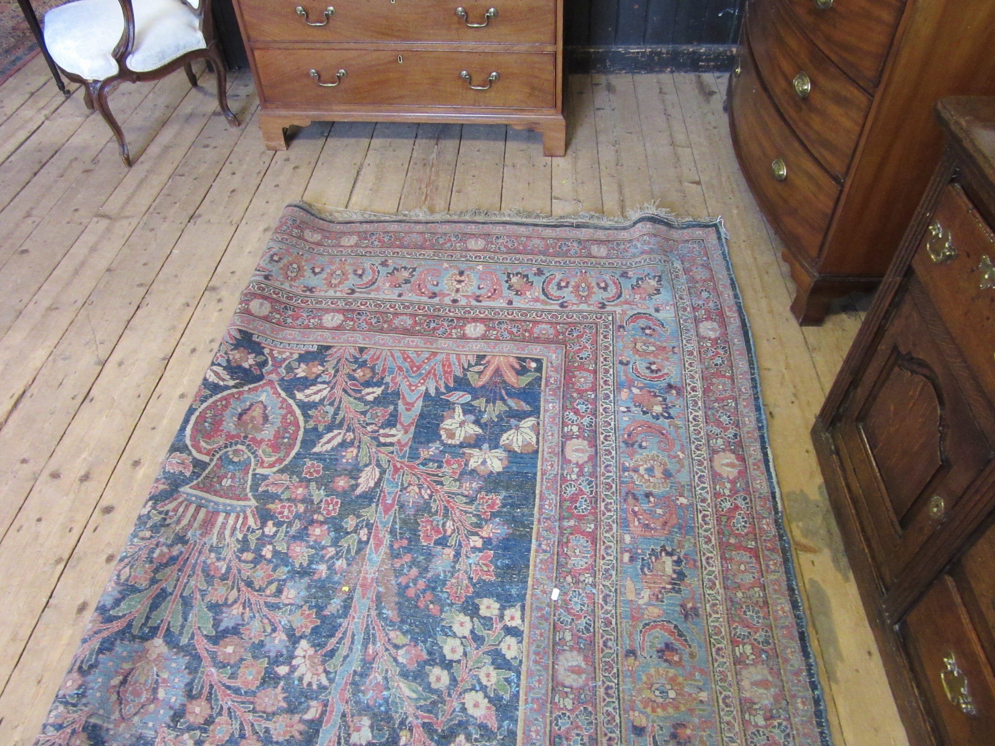 A PERSIAN CARPET, 20th century, the indigo field with Tree of Life style design within pale blue Image