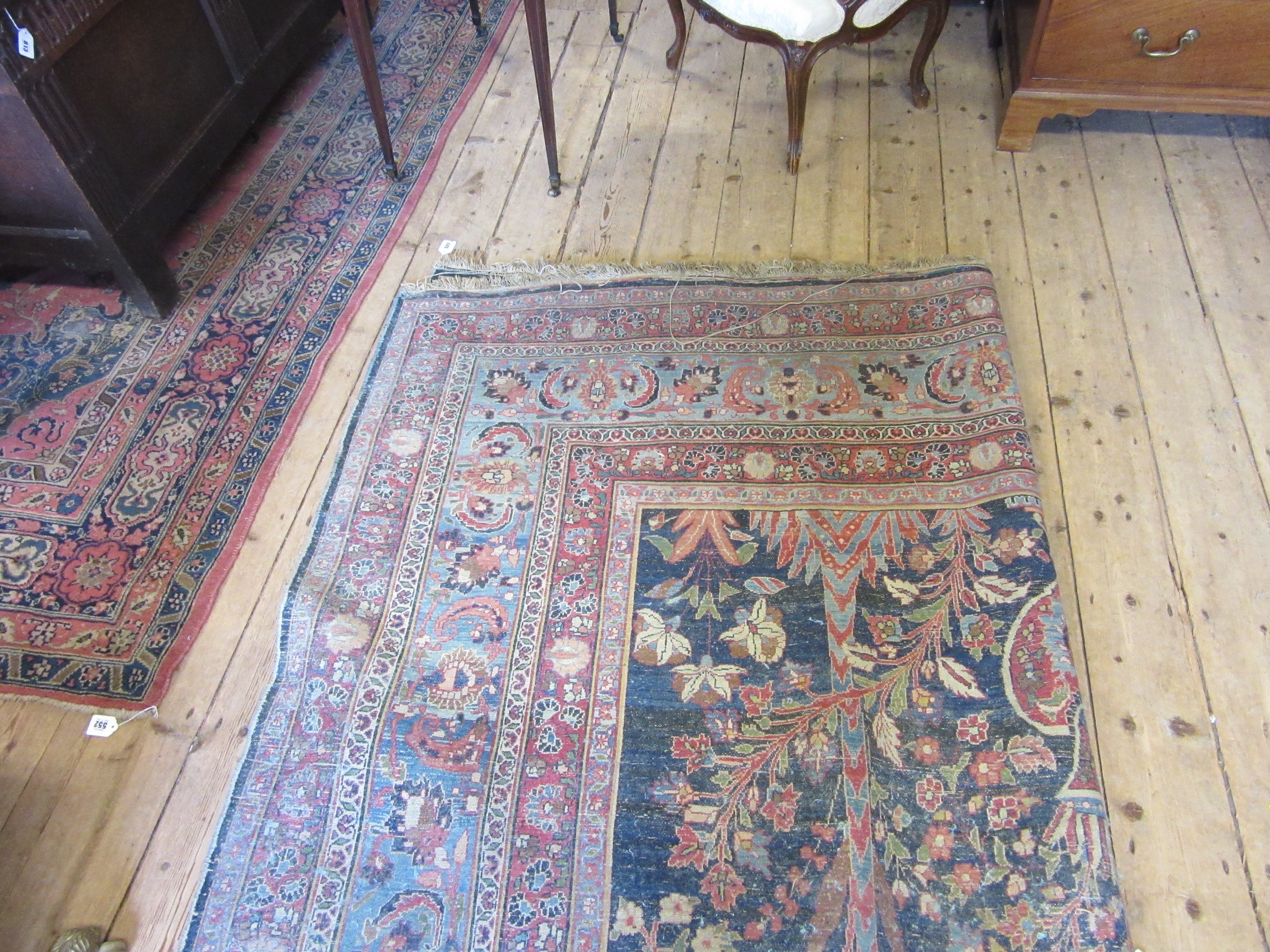 A PERSIAN CARPET, 20th century, the indigo field with Tree of Life style design within pale blue Image