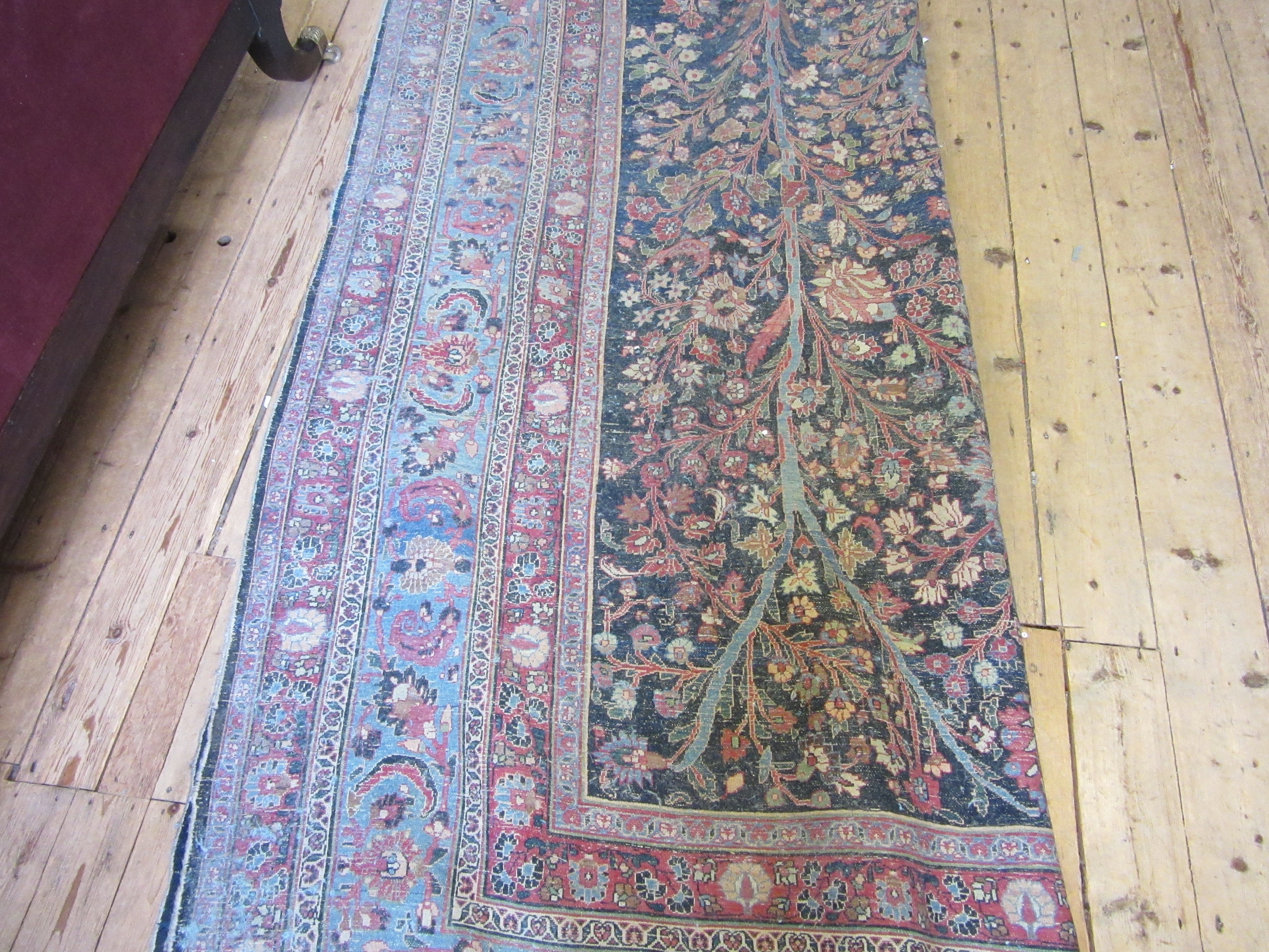 A PERSIAN CARPET, 20th century, the indigo field with Tree of Life style design within pale blue Image