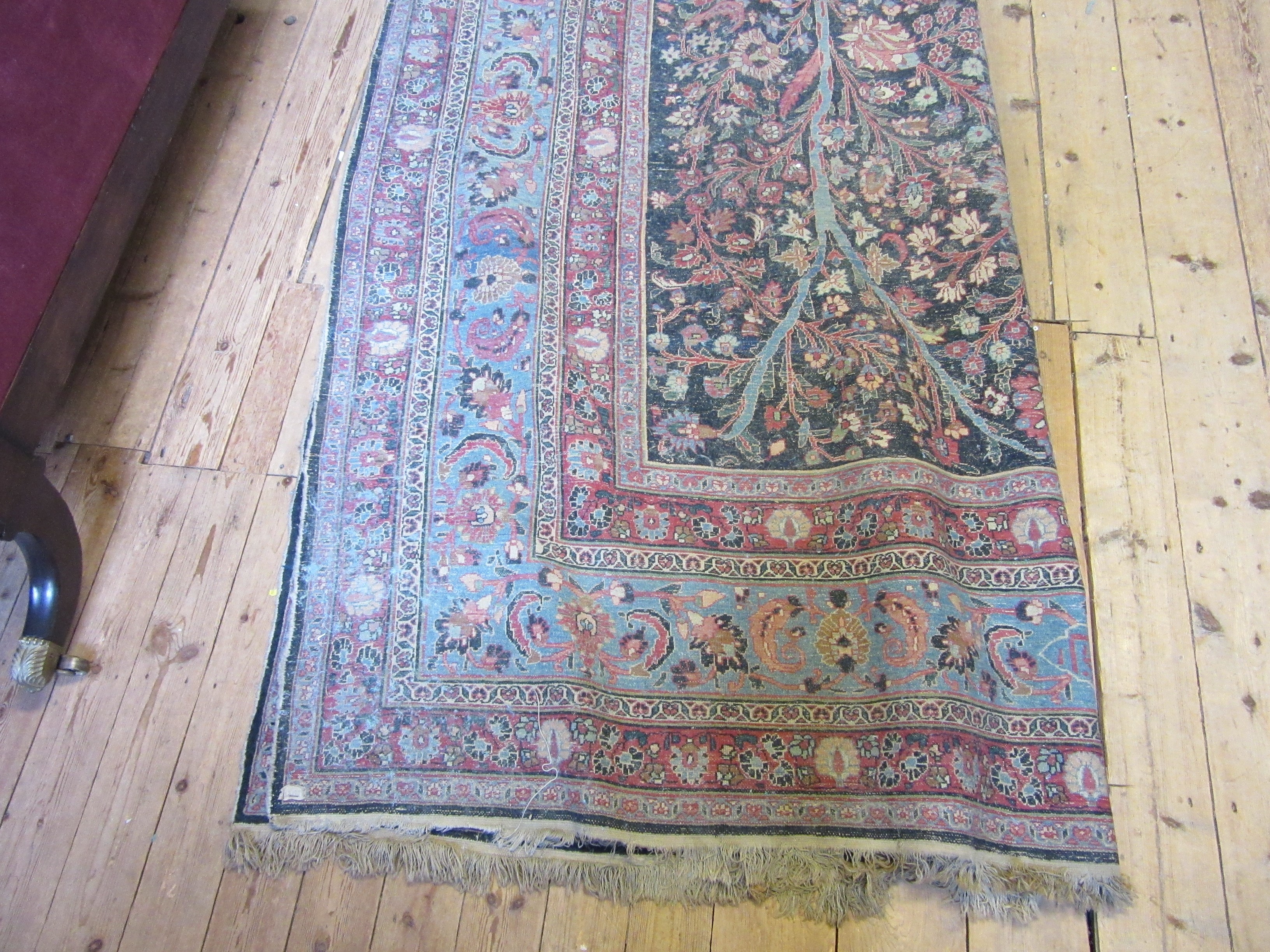 A PERSIAN CARPET, 20th century, the indigo field with Tree of Life style design within pale blue Image