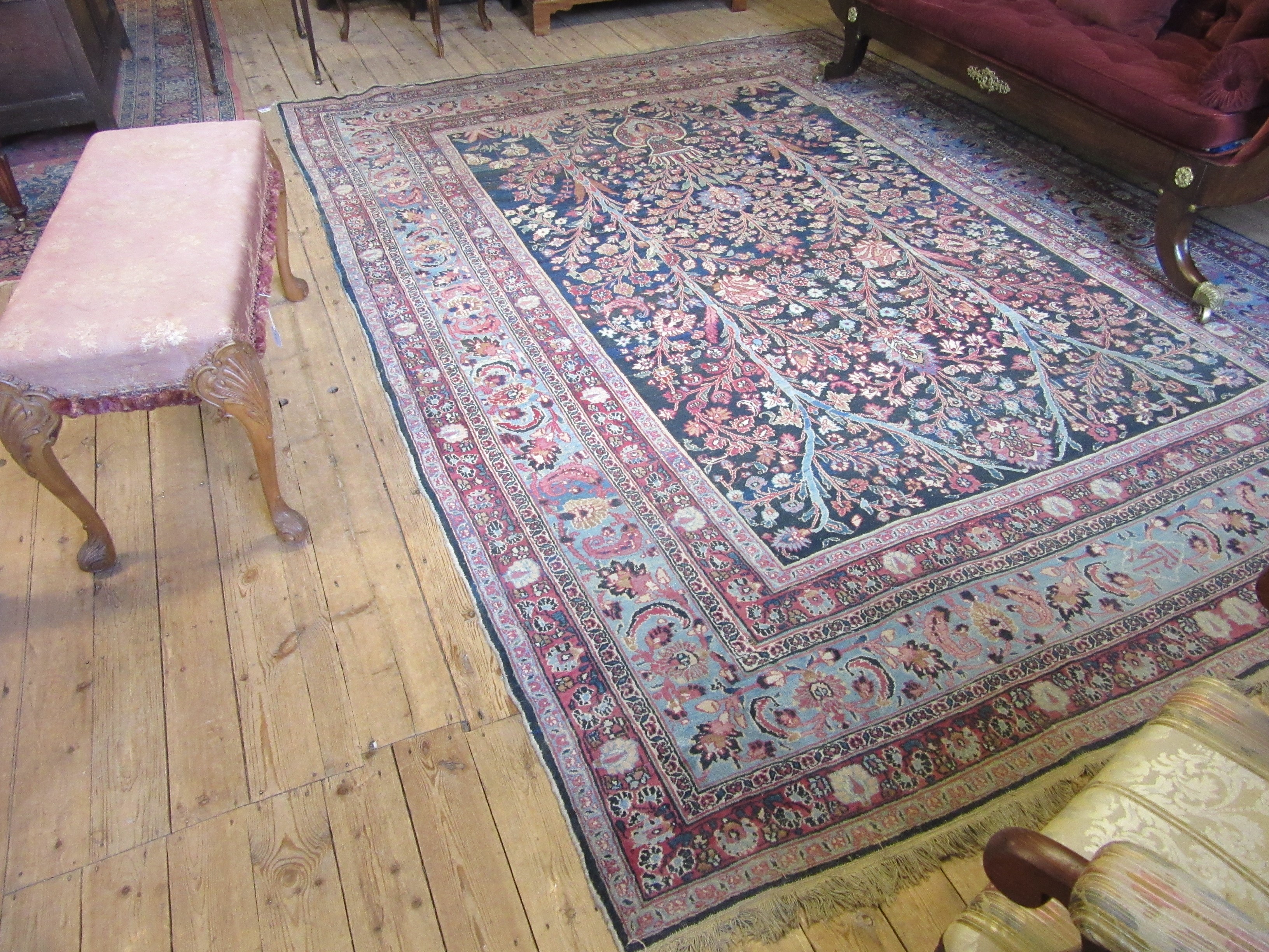 A PERSIAN CARPET, 20th century, the indigo field with Tree of Life style design within pale blue Image