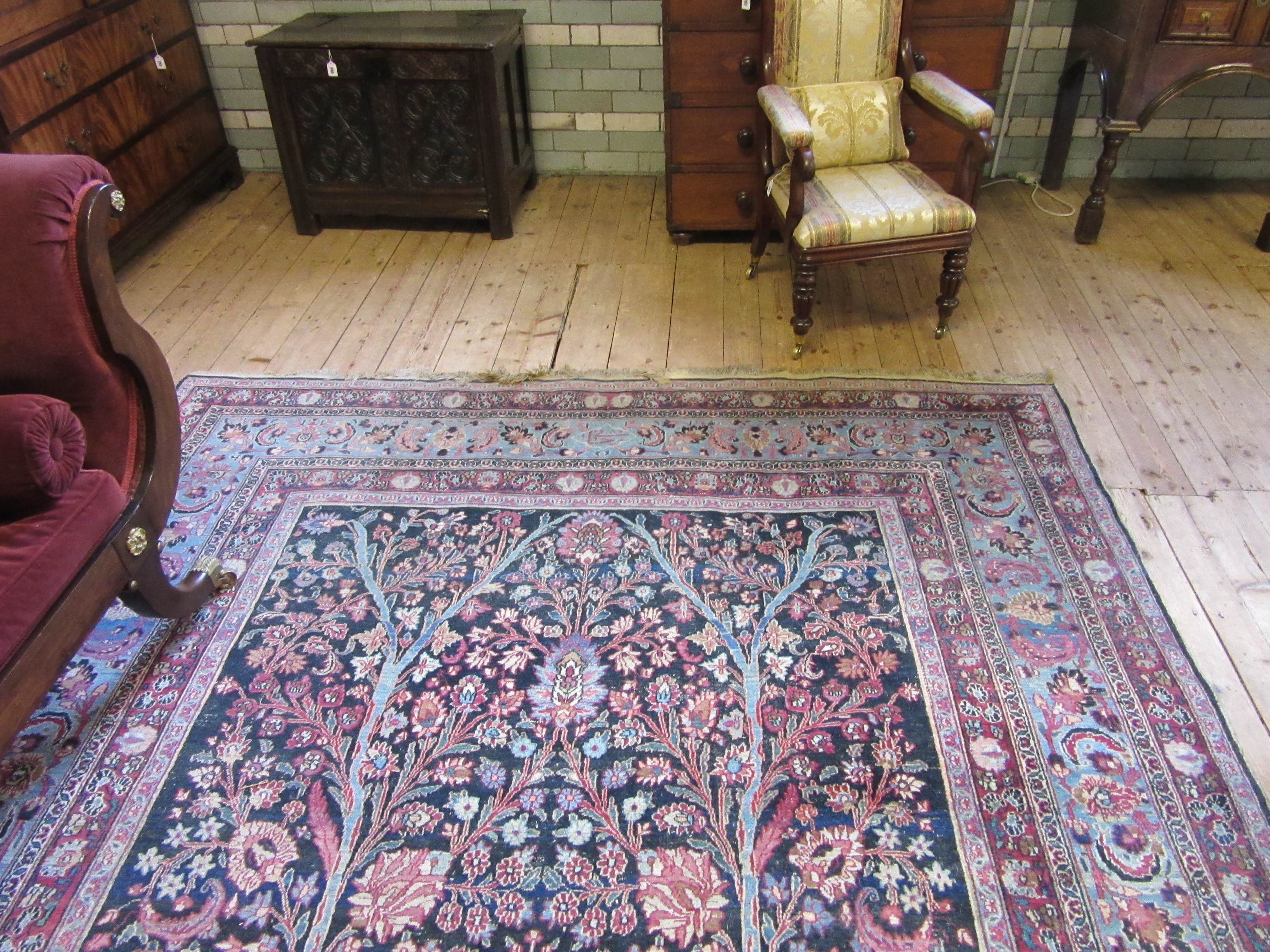 A PERSIAN CARPET, 20th century, the indigo field with Tree of Life style design within pale blue Image
