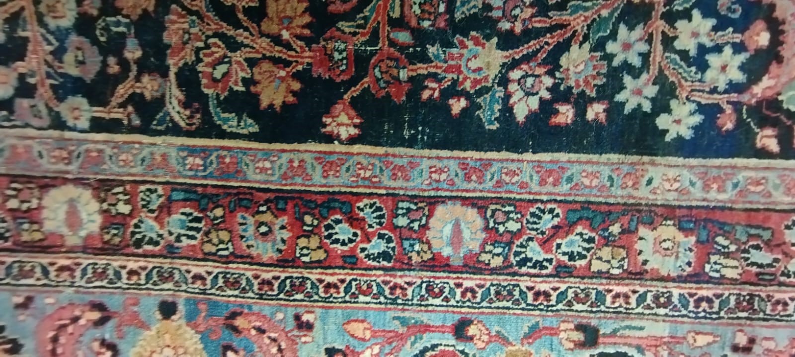 A PERSIAN CARPET, 20th century, the indigo field with Tree of Life style design within pale blue Image
